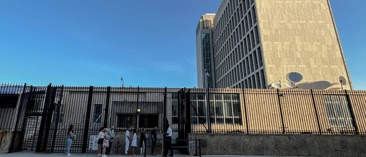 Cubans queue to enter the US embassy in Havana on January 4, 2023. (Photo by ADALBERTO ROQUE/AFP via Getty Images)