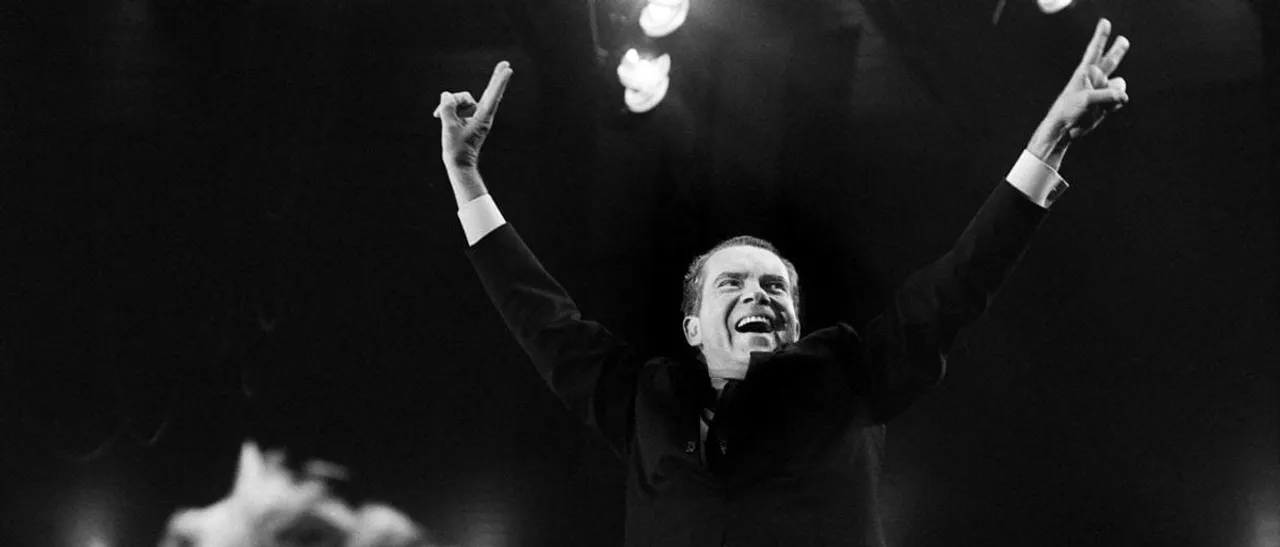 Republican candidate Richard Nixon makes the victory sign in New York City during his last campaign meeting for the presidency of the United States on November, 1968. Richard Nixon is elected in 1968 and re-elected in 1972 but had to resign in August 1974 after the Watergate scandal (Photo by AFP) (Photo by -/AFP via Getty Images)