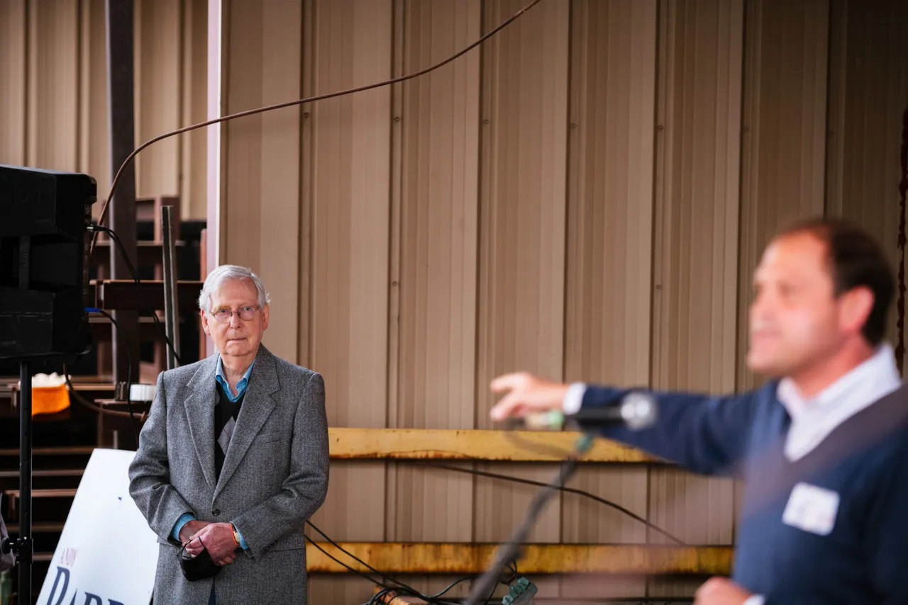 LAWRENCEBURG, KY - OCTOBER 28: Senate Majority Leader Mitch McConnell (R-KY) watches as U.S. Rep. Andy Barr (R-KY) speaks to the press during a campaign stop on October 28, 2020 in Lawrenceburg, Kentucky. McConnell is running against Democratic U.S. Senate candidate Amy McGrath in next week's general election. (Photo by Jon Cherry/Getty Images)