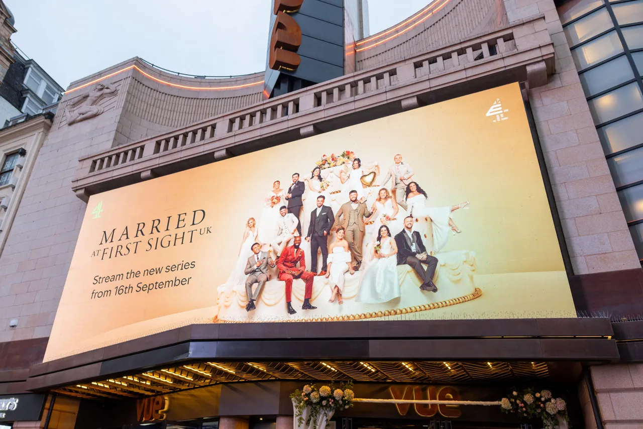 LONDON, ENGLAND - SEPTEMBER 10: A view of branding at the "Married At First Sight" photocall at Vue Leicester Square on September 10, 2024 in London, England. (Photo by Simon Ackerman/Getty Images)