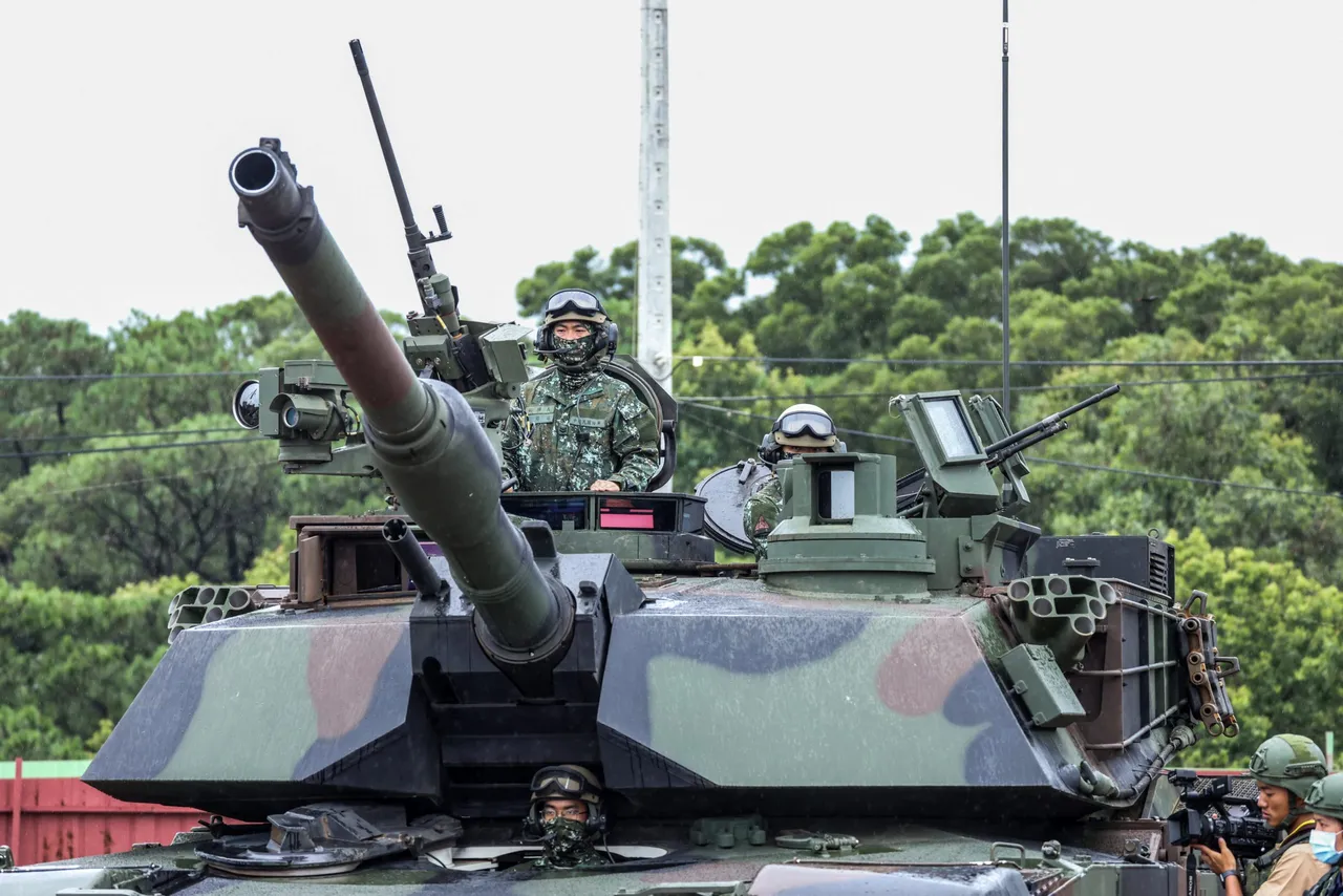 Taiwanese soldiers man a US-made M1A2T Abrams tank during a live-fire shooting session for Taiwan's first batch of the advanced tank, which takes place separately from the annual Han Kuang military exercise, in Hsinchu on July 10, 2025. (Photo by I-HWA CHENG/AFP via Getty Images)