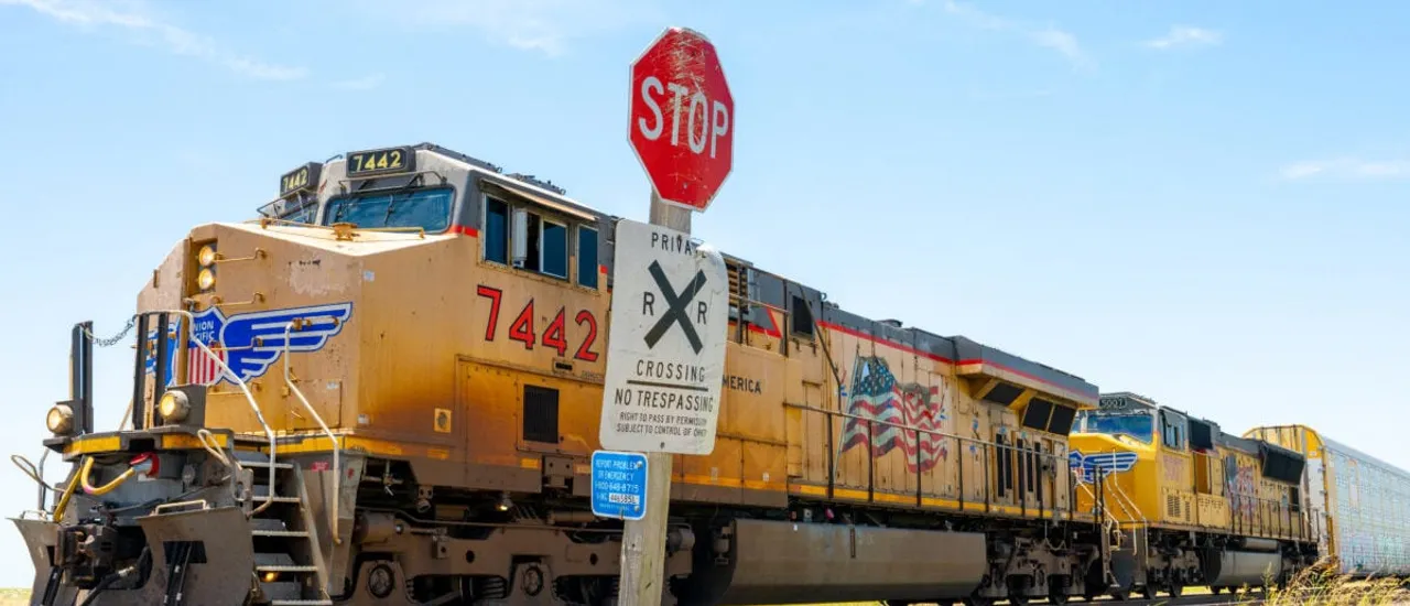 HUTTO, TEXAS - JULY 29: A Union Pacific freight train travels on July 29, 2025 in Hutto, Texas. Union Pacific has reached an agreement to purchase Norfolk Southern in a $85 billion deal. The acquisition forms the United States' first coast-to-coast rail network, spanning over 50,000 miles from East to West. (Photo by Brandon Bell/Getty Images)