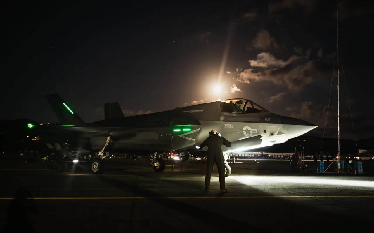 In this handout photo from the U.S. Air Force, a Marine Corps pilot captain guides in a F-35B Lightning II following a large-scale strike against Venezuela military targets in support of Operation Absolute Resolve, in Ceiba, Puerto Rico, Jan. 3, 2026.(Handout photo by Katelynn Jackson/U.S. Air Force via Getty Images)
