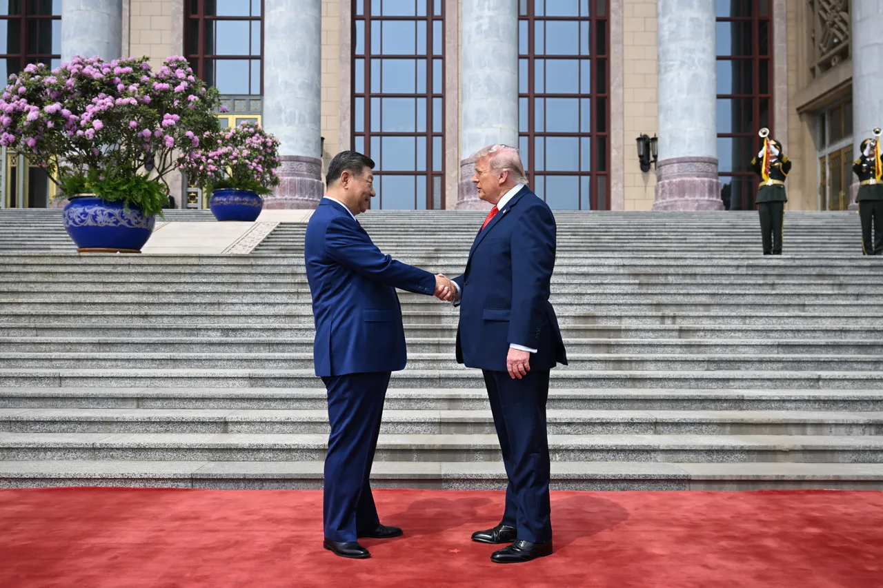 U.S. President Donald Trump is greeted by Chinese President Xi Jinping at the Great Hall of the People on May 14, 2026 in Beijing, China. (Photo by Kenny Holston-Pool/Getty Images)