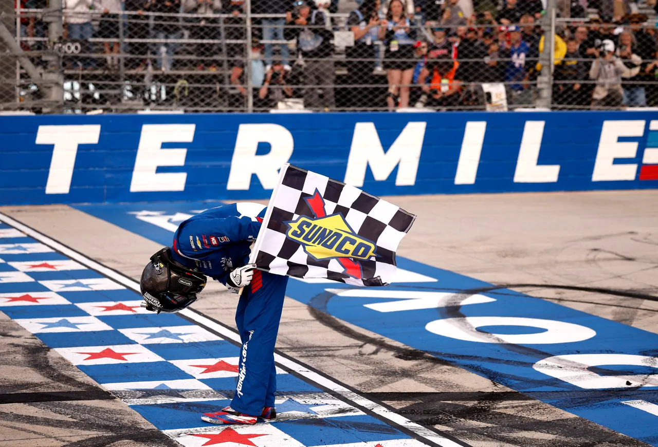 DOVER, DELAWARE - MAY 15: Kyle Busch, driver of the #7 HendrickCars.com Chevrolet, takes a bow after winning the NASCAR Craftsman Truck Series ECOSAVE 200 at Dover Motor Speedway on May 15, 2026 in Dover, Delaware. (Photo by Sean Gardner/Getty Images)