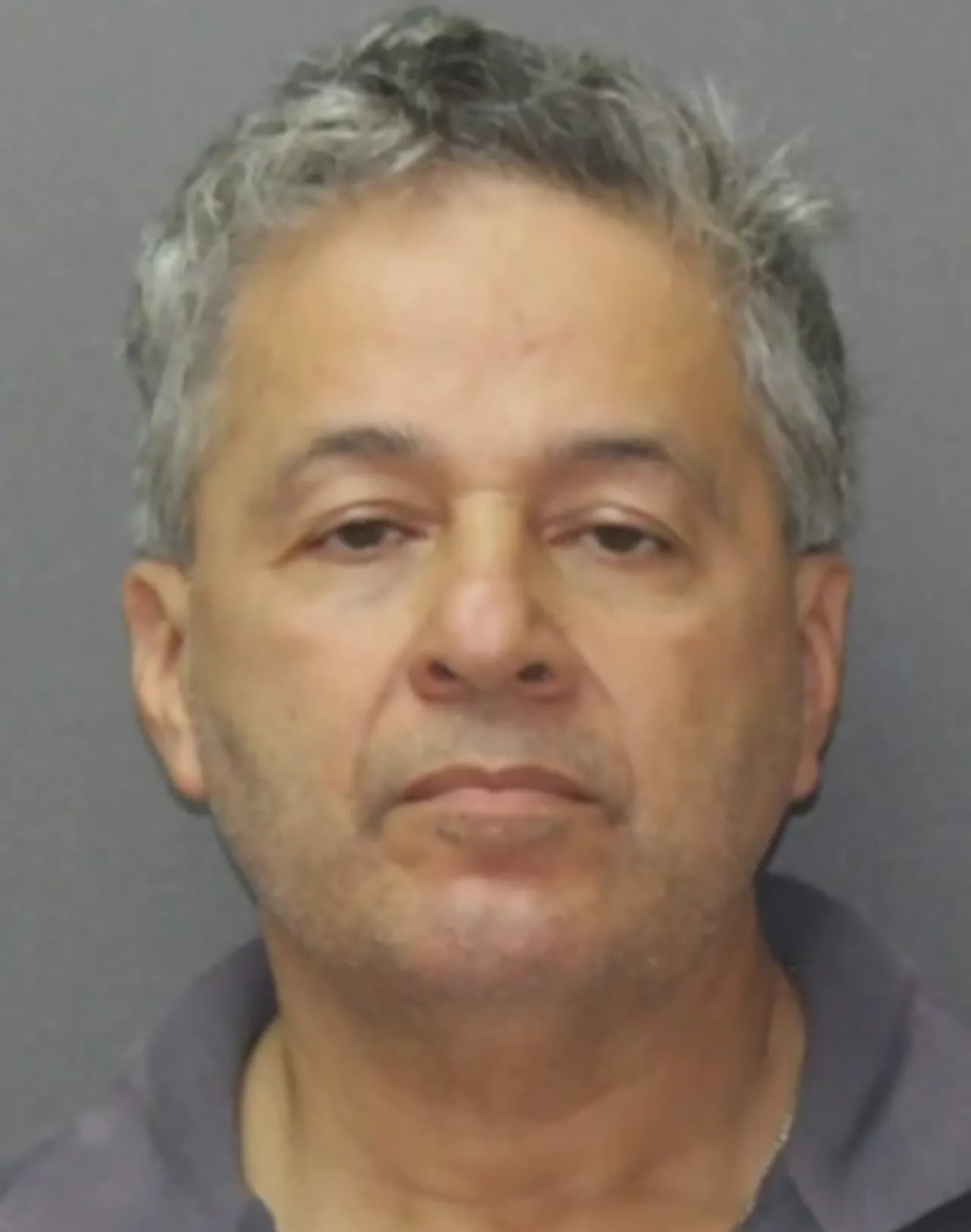 Catholic priest Fernando Cristancho gets his mug shot taken for child sexual abuse charges in Maryland. (Image courtesy of the Harford County Sheriff’s Office)