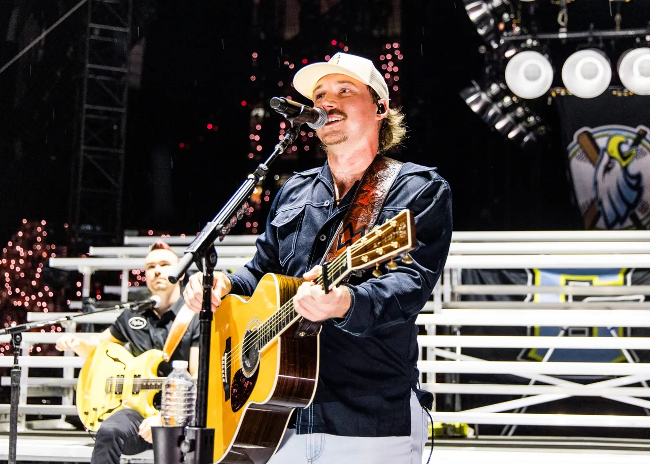KNOXVILLE, TENNESSEE - SEPTEMBER 22: Morgan Wallen performs onstage for night two of his One Night At A Time tour at Neyland Stadium on September 22, 2024 in Knoxville, Tennessee. (Photo by John Shearer/Getty Images for for Morgan Wallen's One Night At A Time 2024)