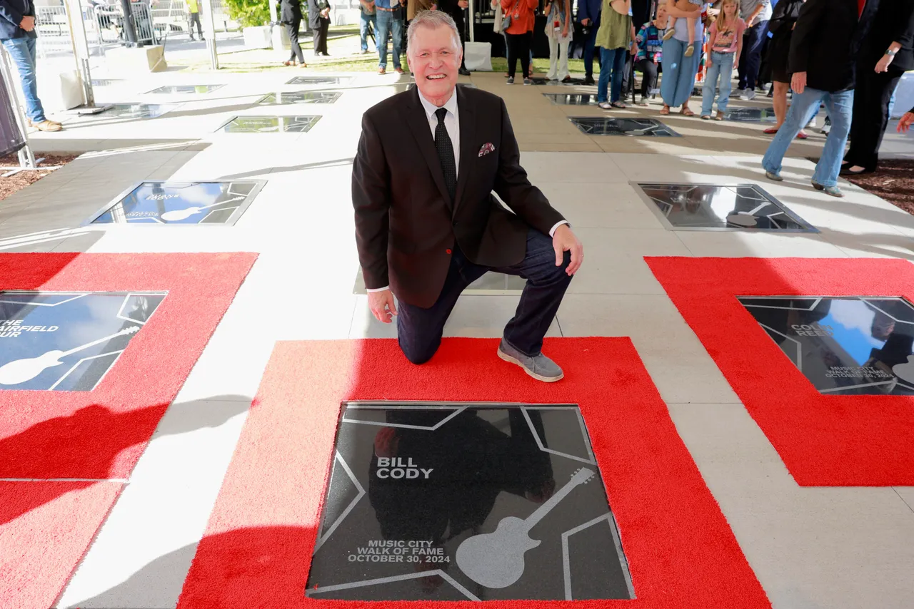 NASHVILLE, TENNESSEE - OCTOBER 30: Bill Cody receives his plaque during the 2024 Music City Walk of Fame Induction ceremony at Music City Walk of Fame on October 30, 2024 in Nashville, Tennessee. (Photo by Jason Kempin/Getty Images)