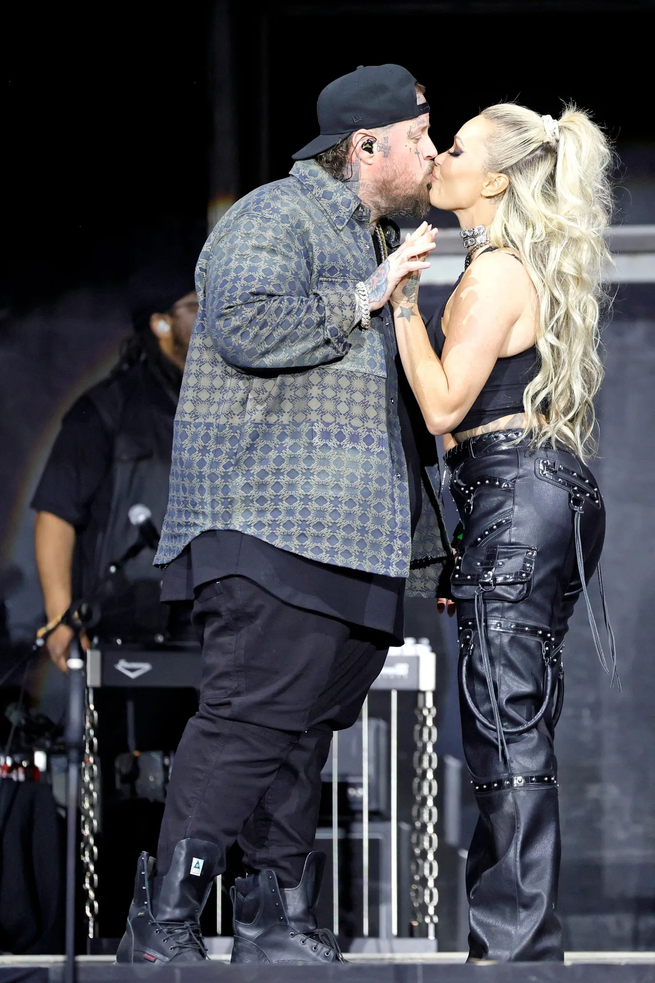 INDIO, CALIFORNIA - APRIL 26: (FOR EDITORIAL USE ONLY) (L-R) Jelly Roll and Bunnie Xo are seen onstage at the T-Mobile Mane Stage during the 2025 Stagecoach Festival on April 26, 2025 in Indio, California. (Photo by Frazer Harrison/Getty Images for Stagecoach)