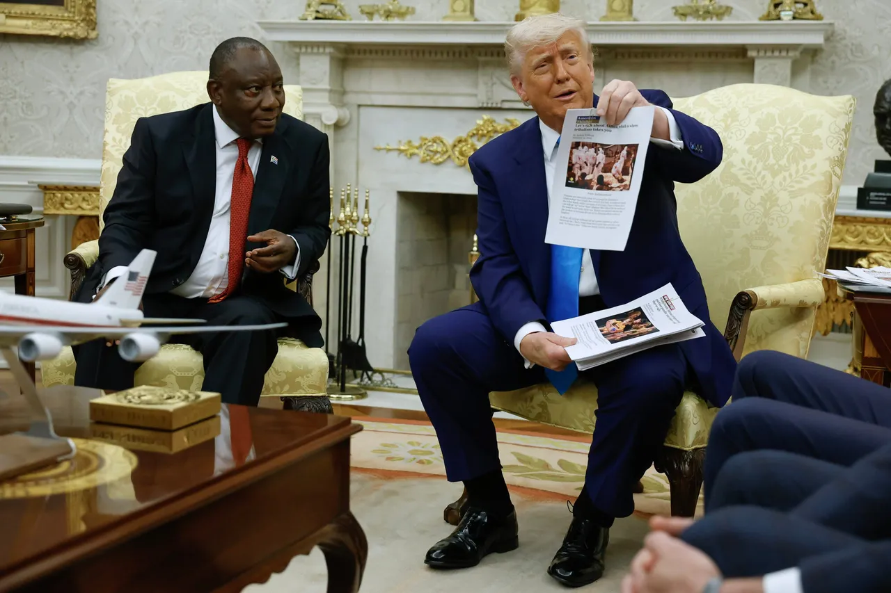 U.S. President Donald Trump holds up a printed article from "American Thinker" while accusing South Africa President Cyril Ramaphosa of state-sanctioned violence against white farmers in South Africa during a press availability in the Oval Office at the White House on May 21, 2025 in Washington, DC. Relations between the two countries have been strained since Trump signed an executive order in February that claimed white South Africans are the victims of government land confiscation and race-based “genocide,” while admitting some of those Afrikaners as refugees to the United States. Trump also halted all foreign aid to South Africa and expelled the country’s Ambassador to the U.S., Ebrahim Rasool. (Photo by Chip Somodevilla/Getty Images)
