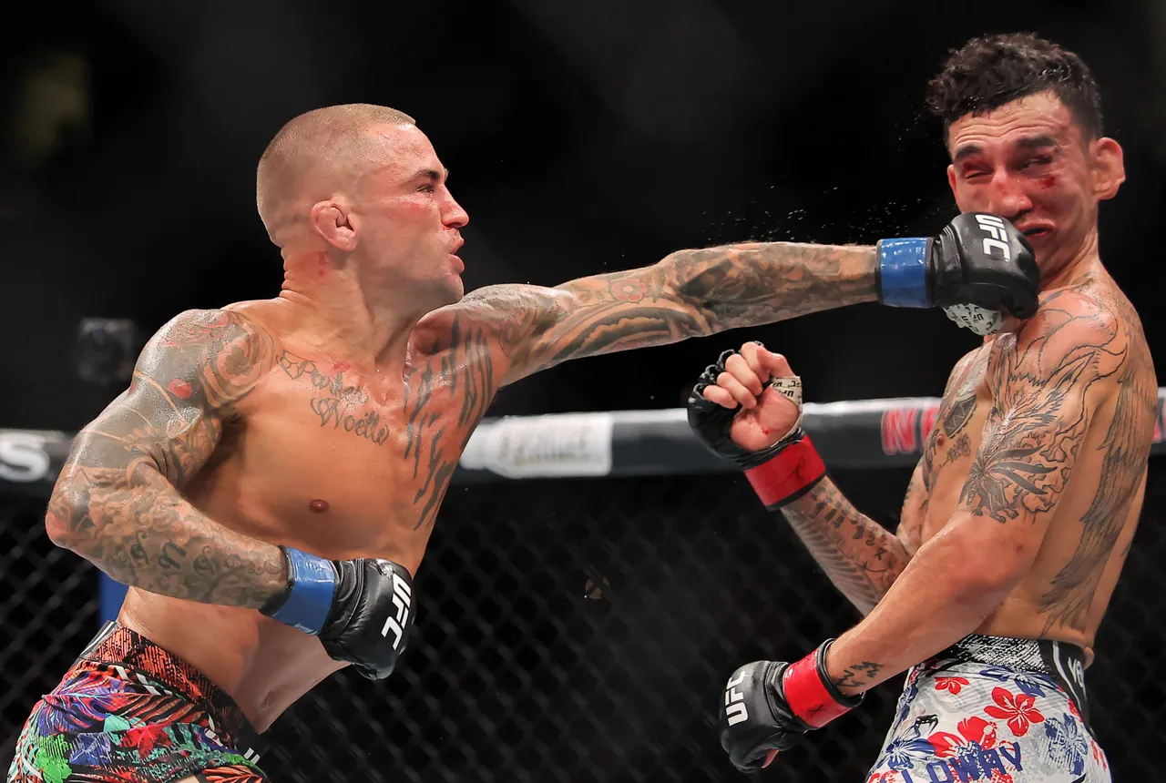 NEW ORLEANS, LOUISIANA - JULY 19: Dustin Poirier of the United States (L) strikes Max Holloway of the United States during their lightweight bout during UFC 318: Holloway vs Poirier 3 at the Smoothie King Center on July 19, 2025 in New Orleans, Louisiana. (Photo by Jonathan Bachman/Getty Images)