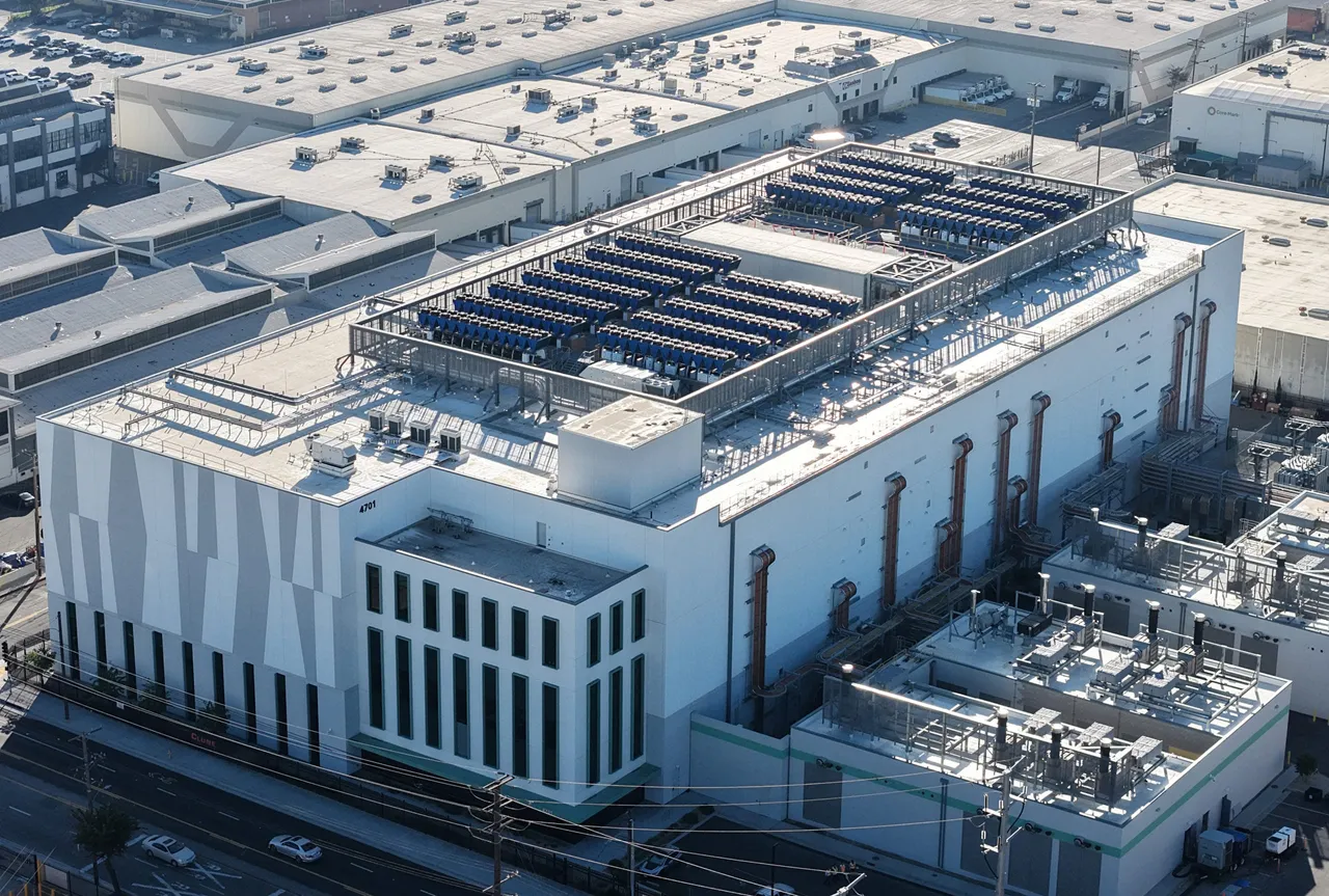 An aerial view of a 33 megawatt data center with closed-loop cooling system on October 20, 2025 in Vernon, California. A surge in demand for AI infrastructure is fueling a boom in data centers across the country and around the globe. (Photo by Mario Tama/Getty Images)
