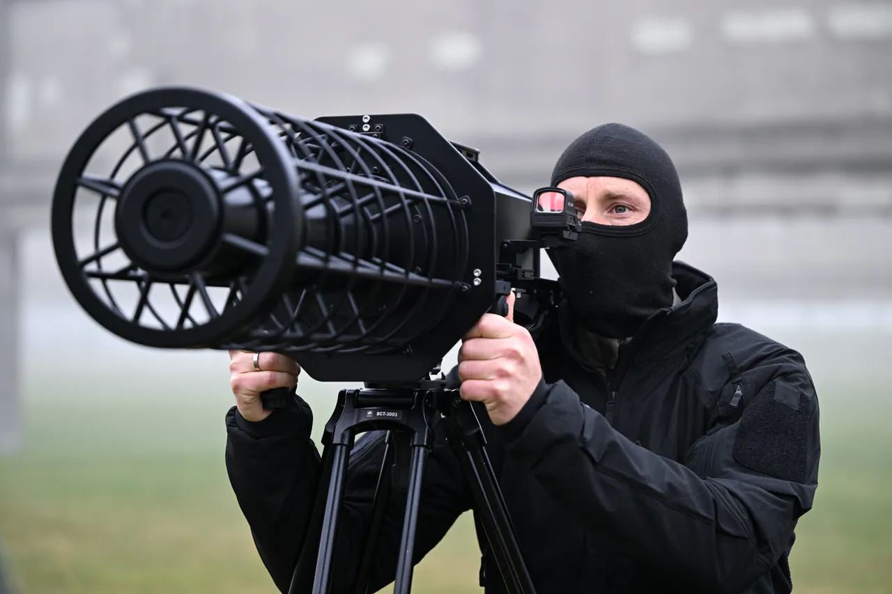A member of the Rhineland-Palatinate State Police aims an electronic frequency jammer used for drone defense during a media event on December 17, 2025 in Ingelheim, Germany.(Photo by Florian Wiegand/Getty Images)