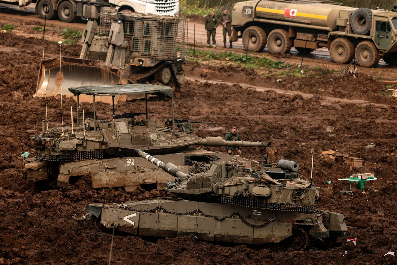 Israeli army Merkava main battle tanks are positioned in the upper Galilee in northern Israel near the border with southern Lebanon on March 26, 2026. (Photo by Jack GUEZ / AFP via Getty Images)