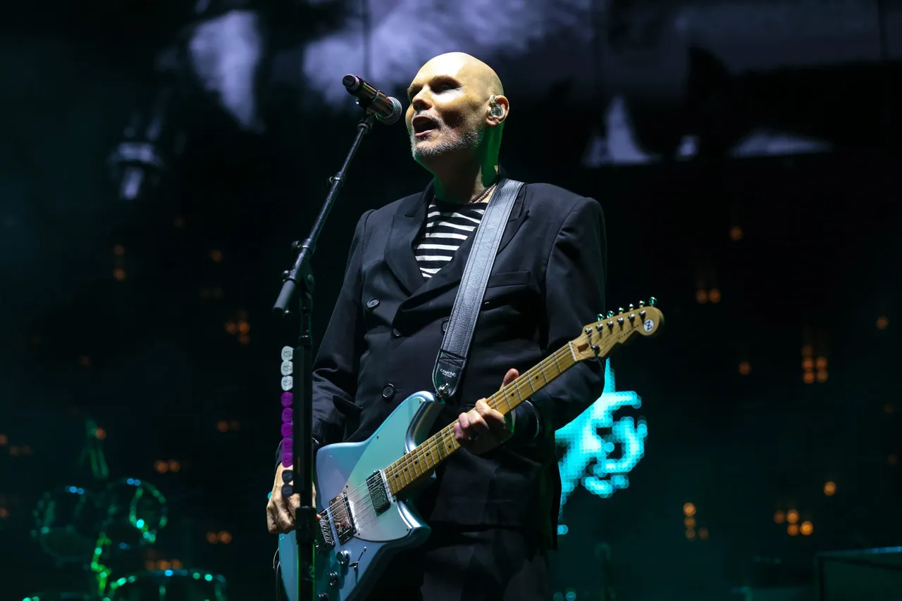 INDIO, CALIFORNIA - APRIL 11: (FOR EDITORIAL USE ONLY) (NOT TO BE LICENSED FOR ANY STANDALONE OR SPECIAL INTEREST BOOK PUBLISHING USE CONCERNING THE COACHELLA MUSIC FESTIVAL AND/OR STAGECOACH MUSIC FESTIVAL) Billy Corgan of Smashing Pumpkins performs with Sombr at the Outdoor Theatre during the 2026 Coachella Valley Music and Arts Festival at Empire Polo Club on April 11, 2026 in Indio, California. (Photo by Frazer Harrison/Getty Images for Coachella)
