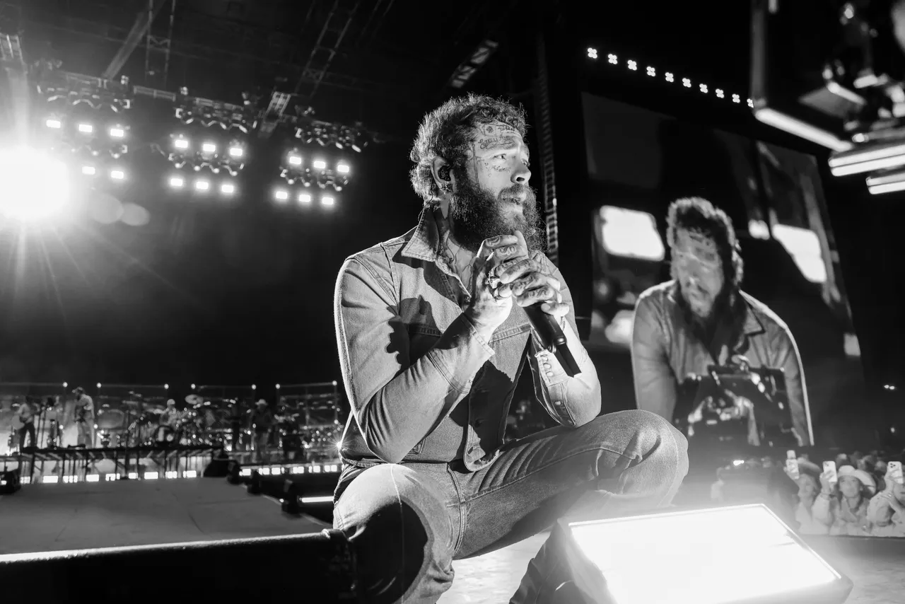 INDIO, CALIFORNIA - APRIL 26: (FOR EDITORIAL USE ONLY) (NOT TO BE LICENSED FOR ANY STANDALONE OR SPECIAL INTEREST BOOK PUBLISHING USE CONCERNING THE COACHELLA MUSIC FESTIVAL AND/OR STAGECOACH MUSIC FESTIVAL) (EDITORS NOTE: Image has been converted to black and white. Color version is available.) Post Malone performs at the T-Mobile Mane Stage during the 2026 Stagecoach Festival at Empire Polo Club on April 26, 2026 in Indio, California. (Photo by John Shearer/Getty Images for Stagecoach)