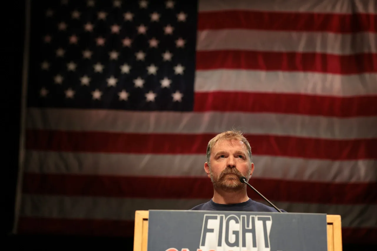 ORONO, MAINE - MAY 24: Democratic U.S. Senate candidate Graham Platner speaks at a “Fighting Oligarchy” tour stop held by Sen. Bernie Sanders (I-VT) at the Collins Center for the Arts on the University of Maine campus on May 24, 2026 in Orono, Maine. Platner is the presumptive Democratic nominee and will face incumbent Sen. Susan Collins (R-ME) for Maine's U.S. Senate seat in the general election. (Photo by Joe Raedle/Getty Images)