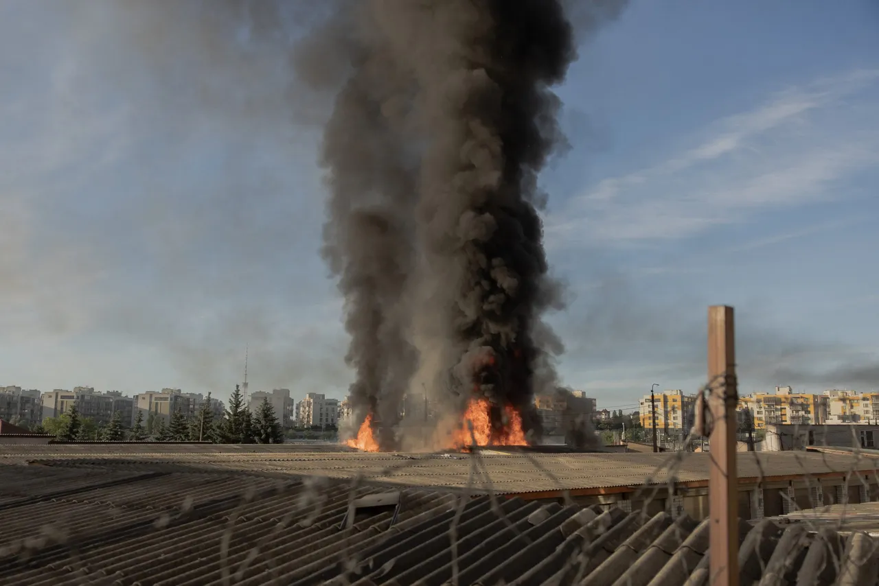 Smoke and flames rise from garages damaged during a Russian missile and drone strikes, in Kyiv on June 2, 2026, amid Russian invasion in Ukraine.(Photo by Roman PILIPEY / AFP via Getty Images)