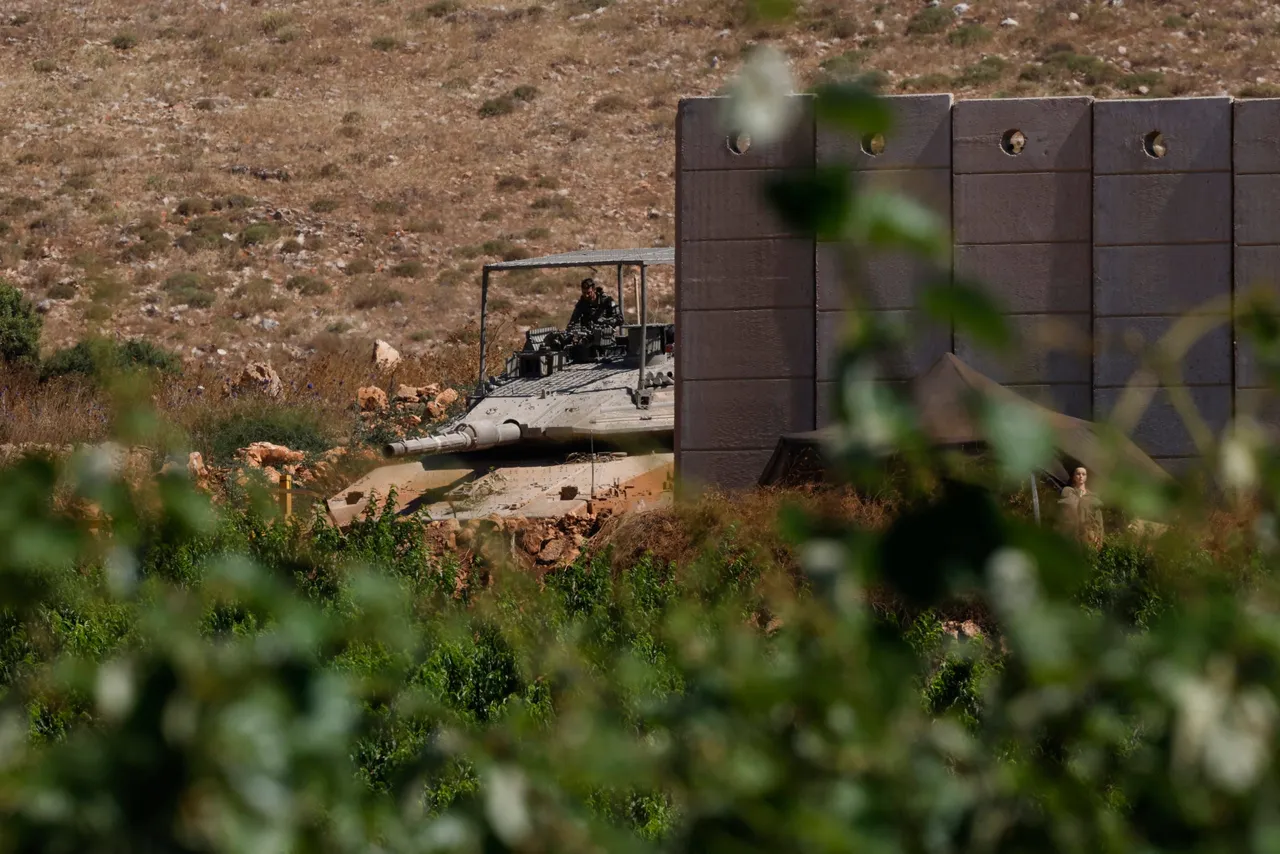 An Israeli army Merkava tank takes position along the northern border with Lebanon in the Upper Galilee on June 18, 2026. Israeli strikes in south Lebanon killed three people on June 18, according to Lebanese state media, hours after the United States and Iran signed an agreement to end the Middle East war. Israel's military, meanwhile, announced the death of one of its soldiers the night before in an incident in south Lebanon that also left seven others wounded. (Photo by Jalaa MAREY / AFP via Getty Images)