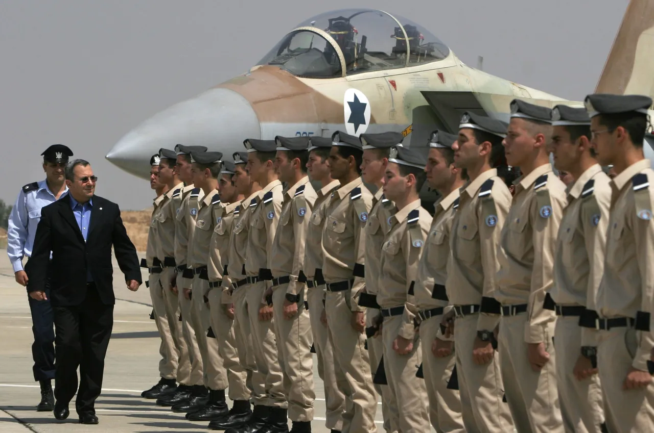 Israel's Defense Minister Ehud Barak inspects an honor guard during a ceremony at the Hazerim Air Force Base July 31, 2007 in Hazerim, Israel. (Photo by Tsafrir Abayov - Pool/Getty Images)