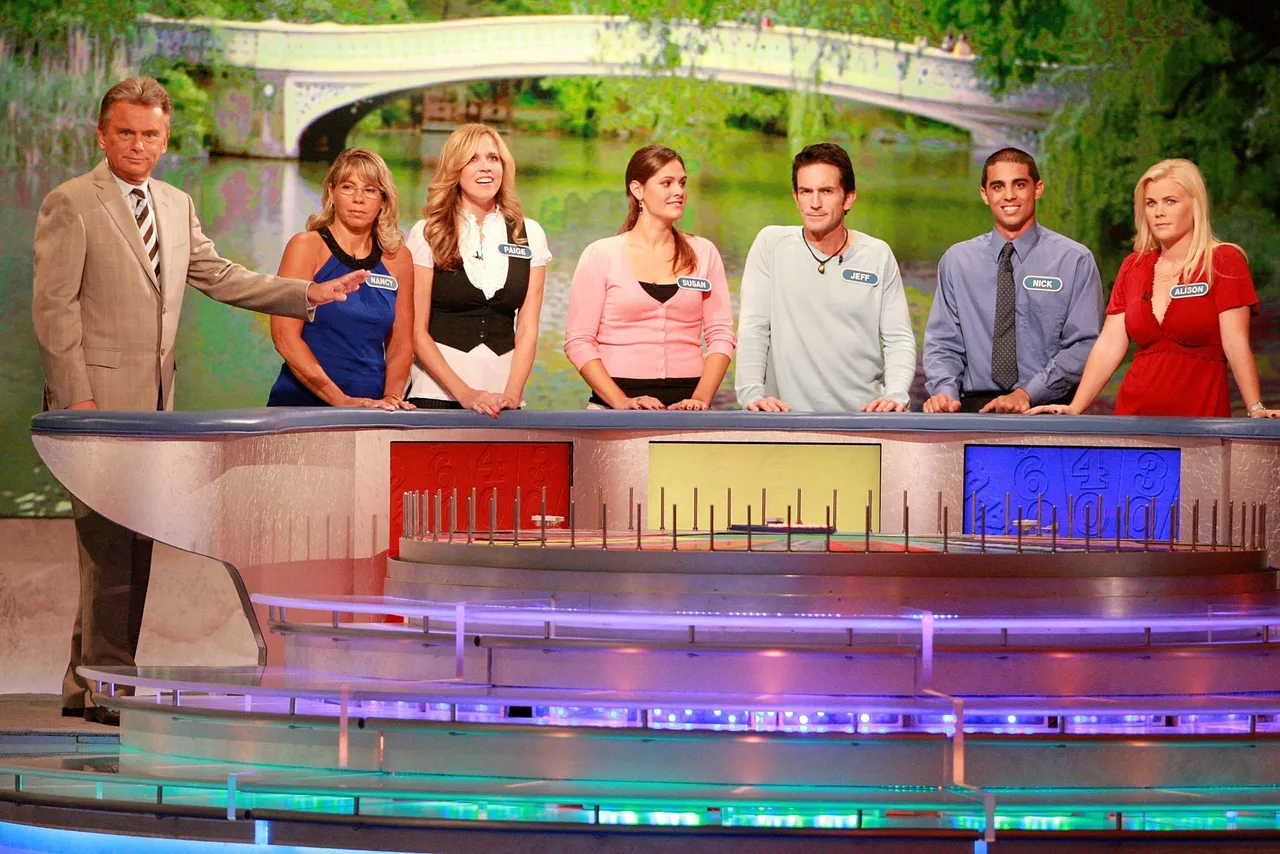 NEW YORK - SEPTEMBER 29: (L-R) Host Pat Sajak greets Nancy Kaufman, actress Paige Hemmis, Susan Moran, actor Jeff Probst, Nick Giovine and actress Alison Sweeney during a taping of "Wheel Of Fortune Celebrity Week" celebrating the television game show's 25th anniversary at Radio City Music Hall on September 29, 2007 in New York City. (Photo by Astrid Stawiarz/Getty Images)