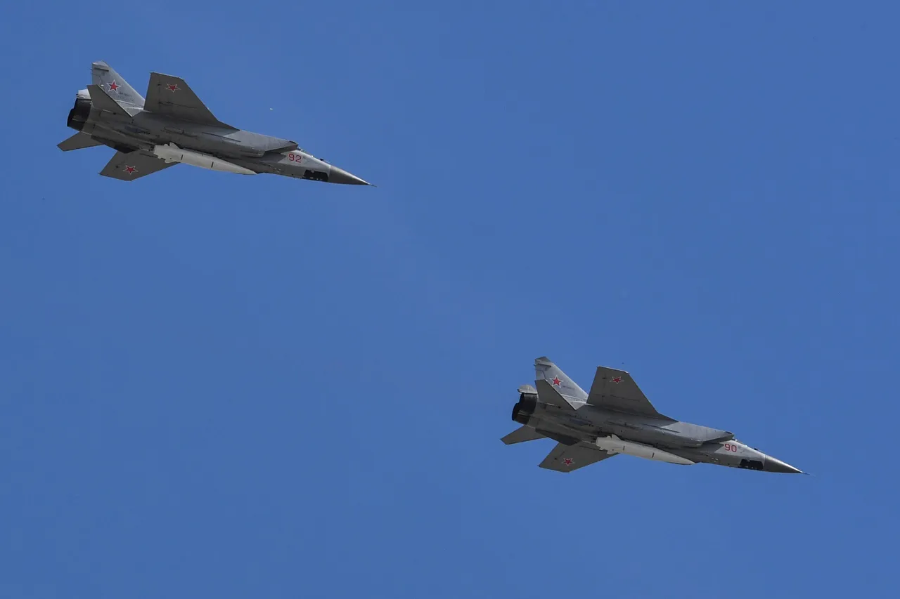 Russia's MiG-31 supersonic interceptor jets carrying hypersonic Kinzhal (Dagger) missiles fly over Red Square during the Victory Day military parade in Moscow on May 9, 2018. (YURI KADOBNOV/AFP via Getty Images)
