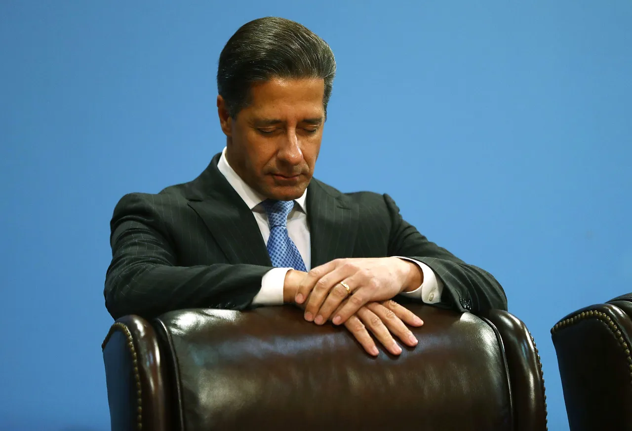 MIAMI, FL - MARCH 01: Miami-Dade Schools Superintendent Alberto Carvalho observes a moment of silence. (Photo by Joe Raedle/Getty Images)