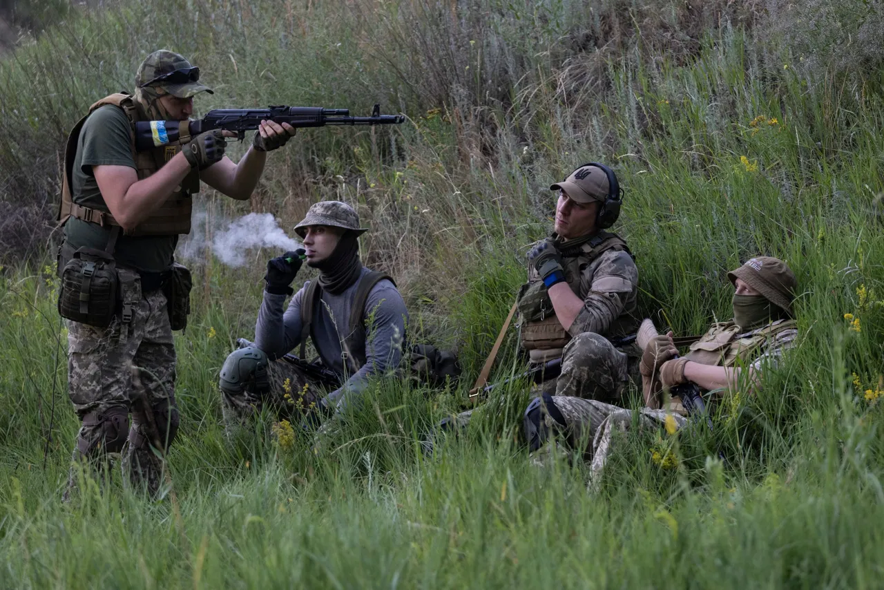 Azov Regiment soldiers are seen during weapons training on June 28, 2022, in the Kharkiv region, Ukraine. (Photo by Paula Bronstein/Getty Images)