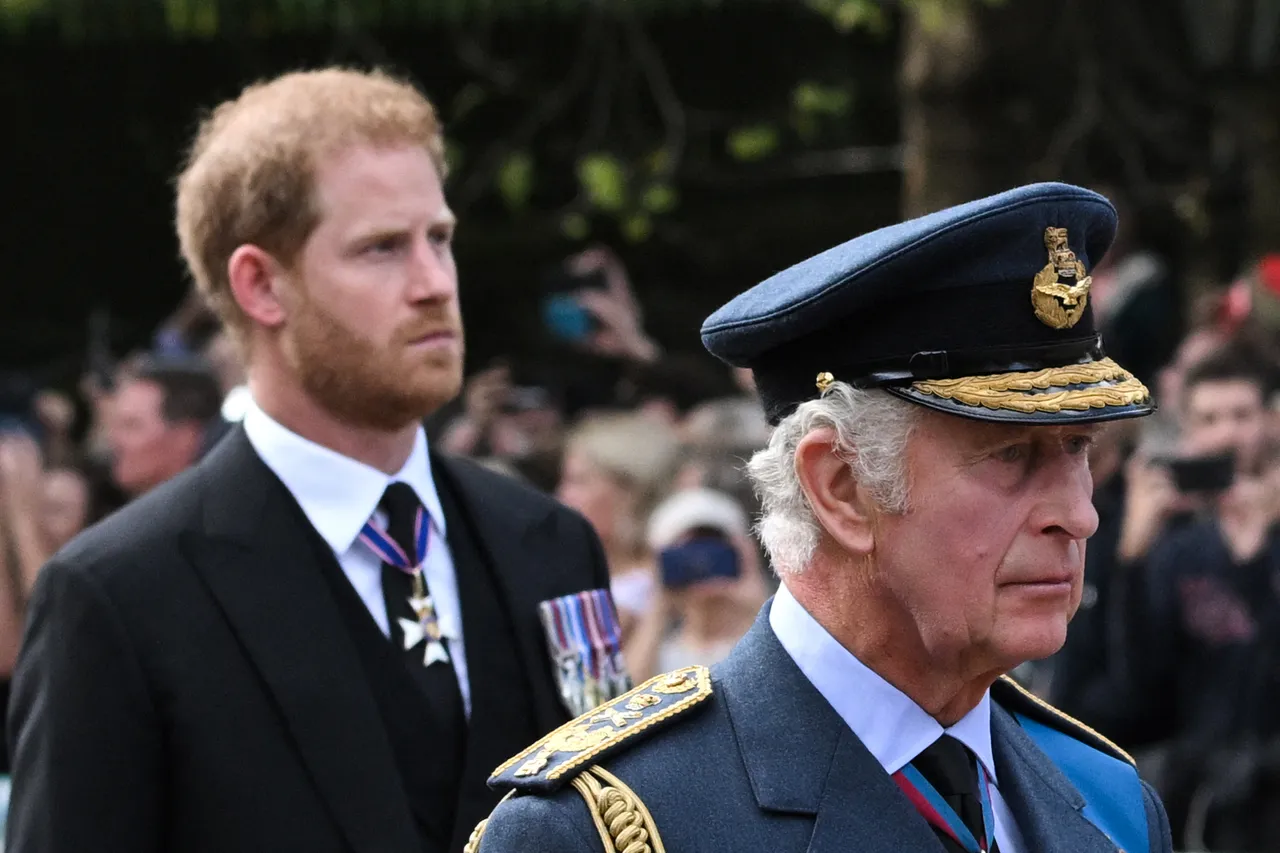 TOPSHOT - Britain's King Charles III and Britain's Prince Harry, Duke of Sussex walk behind the coffin of Queen Elizabeth II, adorned with a Royal Standard and the Imperial State Crown and pulled by a Gun Carriage of The King's Troop Royal Horse Artillery, during a procession from Buckingham Palace to the Palace of Westminster, in London on September 14, 2022. Queen Elizabeth II will lie in state in Westminster Hall inside the Palace of Westminster, from Wednesday until a few hours before her funeral on Monday, with huge queues expected to file past her coffin to pay their respects. (Photo by LOIC VENANCE / AFP via Getty Images)