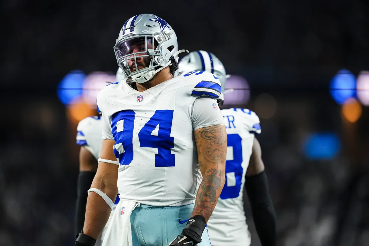 ARLINGTON, TX - DECEMBER 22: Marshawn Kneeland #94 of the Dallas Cowboys looks on from the field during an NFL football game against the Tampa Bay Buccaneers at AT&T Stadium on December 22, 2024 in Arlington, Texas. (Photo by Cooper Neill/Getty Images)