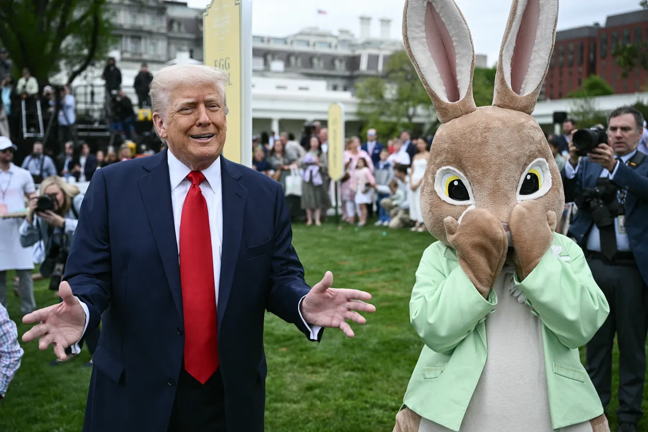 US President Donald Trump speaks as he stands next to an constumed Easter bunny during the annual Easter Egg Roll on the South Lawn of the White House on April 21, 2025, in Washington, DC. (Photo by BRENDAN SMIALOWSKI/AFP via Getty Images)