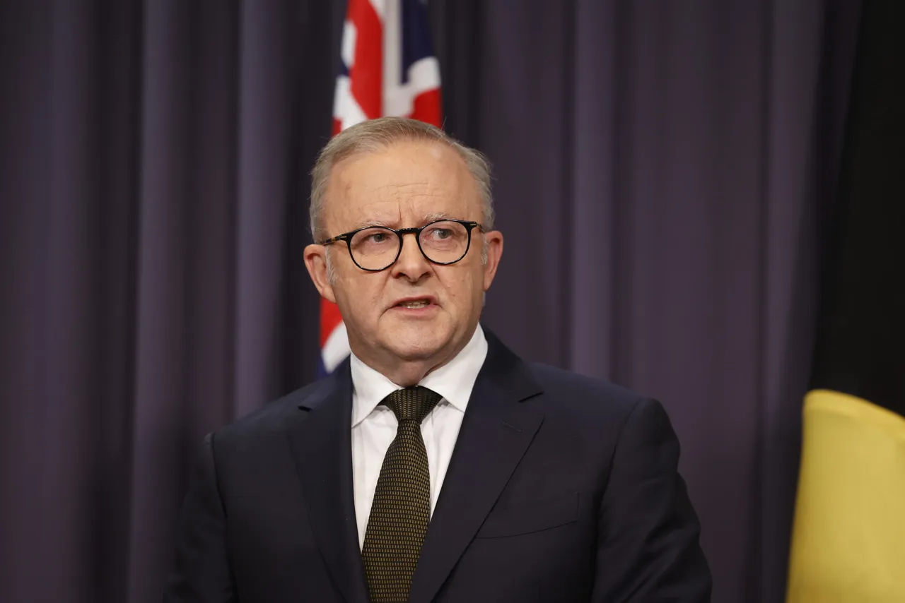 CANBERRA, AUSTRALIA - DECEMBER 14: Prime Minister Anthony Albanese speaks to the media at Parliament House Canberra on December 14, 2025 in Canberra, Australia. Two gunmen dressed in black fired several shots at Sydney's world-famous Bondi Beach, causing at least 10 injuries and three deaths, and setting off mass panic on a Sunday evening. (Photo by Hilary Wardhaugh/Getty Images)