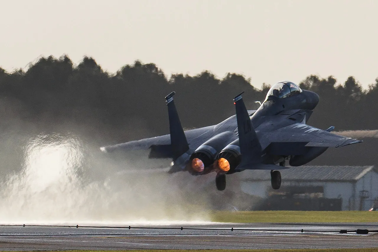 An F15 fighter plane takes off from RAF Lakenheath at sunset on January 07, 2026 in Mildenhall, England. There have been recent reports of increased United States Air Force aircraft arriving at American bases in England this week, including RAF Fairford in Gloucestershire and at RAF Mildenhall in Suffolk. (Photo by Dan Kitwood/Getty Images)