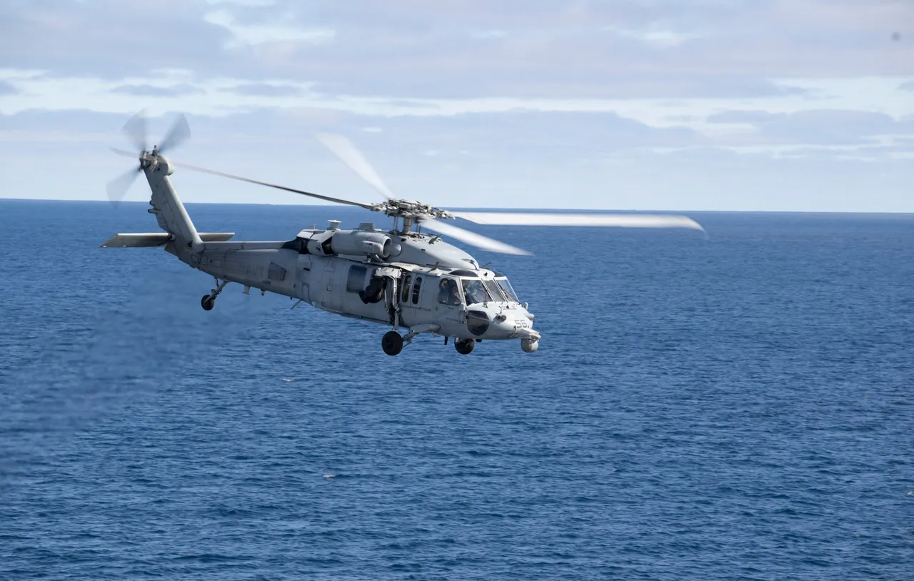 In this handout photo provided by NASA, a U.S. Navy MH-60 Seahawk from Helicopter Sea Combat Squadron (HSC) 23 departs from the flight deck of USS John P. Murtha as NASA and U.S. military teams deploy in preparation for the the return of the Artemis II crewmembers to Earth, Friday, April 10, 2026, in the Pacific Ocean off the coast of California. (Photo by Joel Kowsky/NASA via Getty Images)