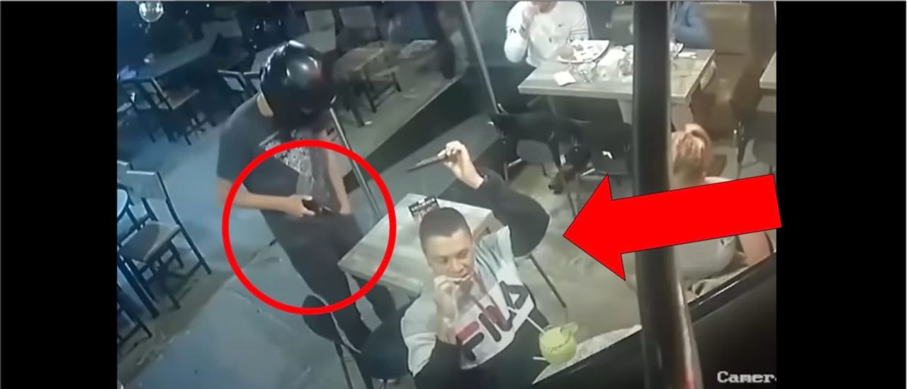 WATCH: Man Eats Chicken Wings While Being Robbed At Gunpoint In Incredible Viral Video