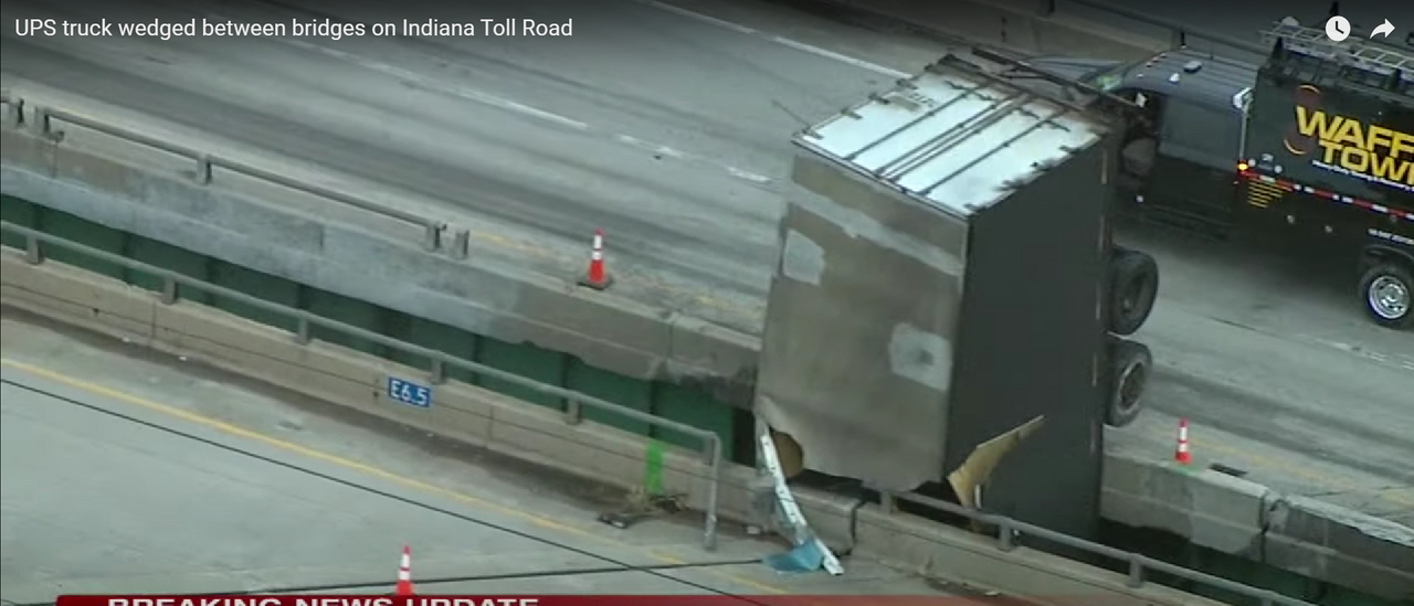Clinging To A Bridge: Truck Driver’s Wild Crash Sounds Like Something Out Of A Movie