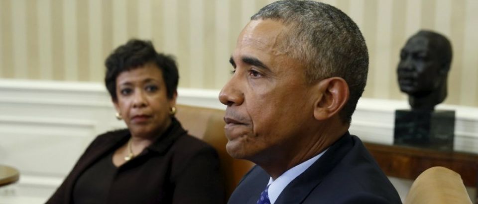 U.S. Attorney General Lynch looks toward U.S. President Obama during a meeting with other top law enforcement officials to discuss what executive actions he can take to curb gun violence, in the Oval Office of the White House in Washington