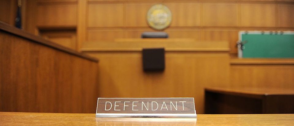 A view of the defendant's table in a cou