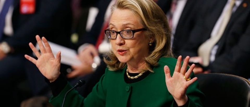 Clinton testified to the Senate Foreign Relations Committee, including Corker and Menendez. (Reuters)