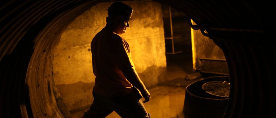 Coal miner Mike Hawks, 53, stands in an underground tunnel at a coal processing facility near Gilbert