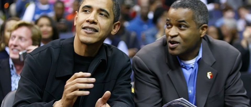 President Barack Obama talks with his friend Marty Nesbitt at the Chicago Bulls vs Washington Wizards basketball during their game played at the Verizon Center in Washington, D.C., Friday, February 27, 2009. (Photo by Harry E. Walker/MCT/MCT via Getty Images)