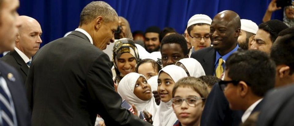 Obama greets students after his remarks at the Islamic Society of Baltimore mosque in Catonsville, Maryland