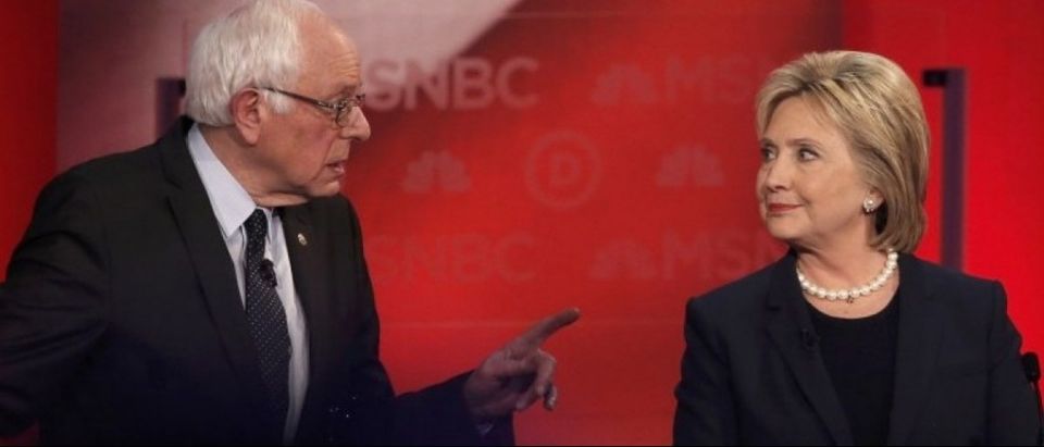 Democratic U.S. presidential candidate Senator Sanders speaks directly to former Secretary of State Clinton as they discuss issues during the Democratic presidential candidates debate sponsored by MSNBC at the University of New Hampshire in Durham