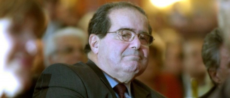 US Supreme Court Justice Scalia sits in the audience at a National Italian American Foundation event in Washington