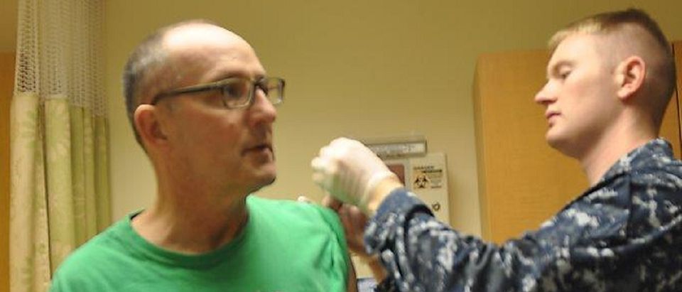 A veteran is treated by Navy Petty Officer 2nd Class Dwight Koontz at Lovell hospital (Provided photo)
