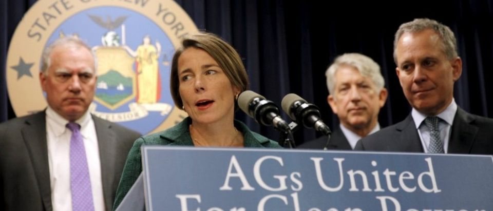 Massachusetts Attorney General Maura Healey (C) speaks at a news conference with New York Attorney General Eric Schneiderman (R) and other U.S. State Attorney's General to announce a state-based effort to combat climate change in the Manhattan borough of New York City, March 29, 2016. REUTERS/Mike Segar