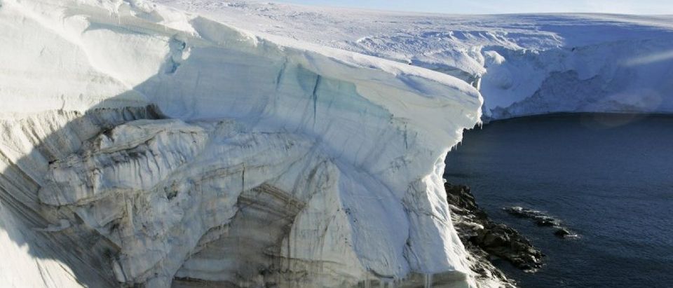 File photo shows melting ice through at a cliff face at Landsend, on the coast of Cape Denison in Antarctica