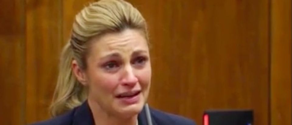 Erin Andrews cries over peephole video in court.