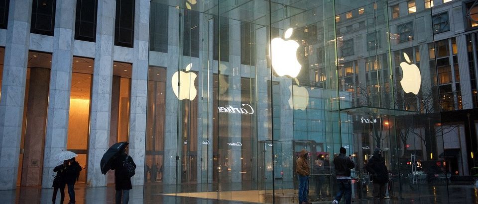 Pedestrians walk past the Apple store on 5th Avenue on February 23, 2016 in New York, NY. Protestors gathered outside the store to support Apple's decision to resist the FBI's pressure for Apple to build a "backdoor" to the iPhone of Syed Rizwan, one of the two San Bernardino shooters. Photo by Bryan Thomas/Getty Images