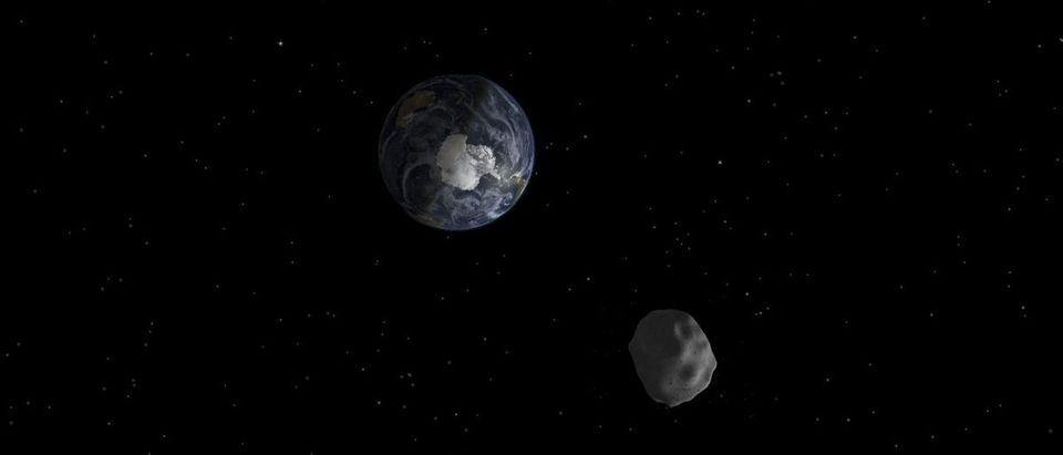 NASA handout image of the passage of asteroid 2012 DA14 through the Earth-moon system